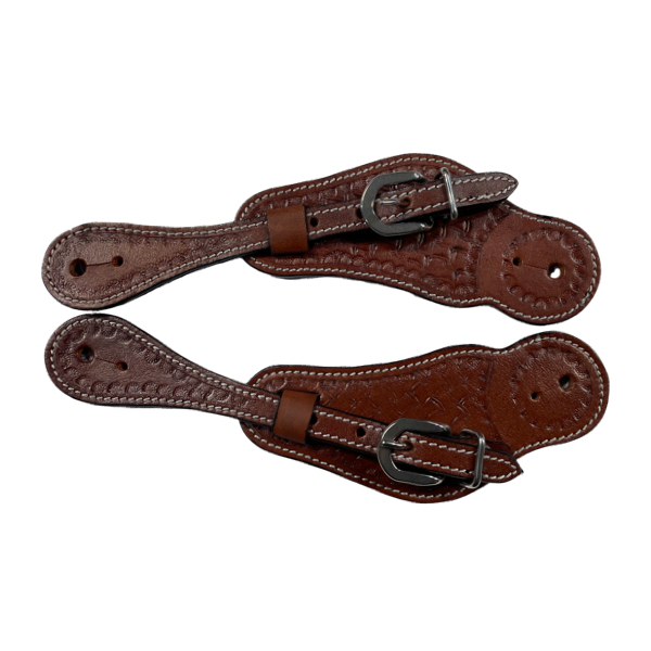 Pair of brown leather spurs with metal buckles on a white background