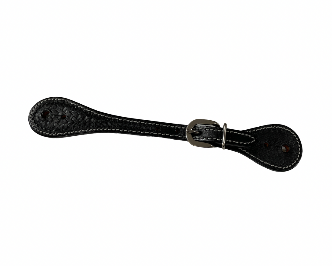 Black leather strap with a buckle on a white background