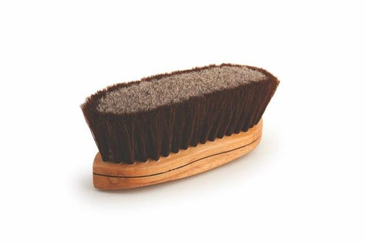 Wooden brush with a brown bristle head on a white background